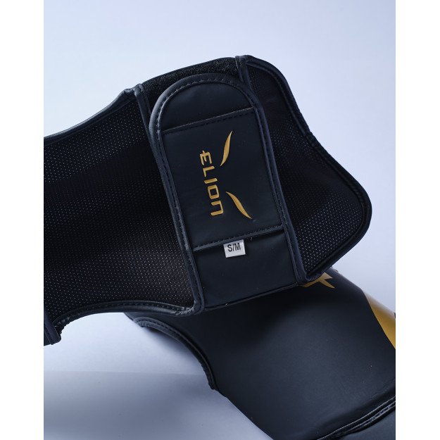 Protège Tibia et Pied Elion Extravagant Noir/Or