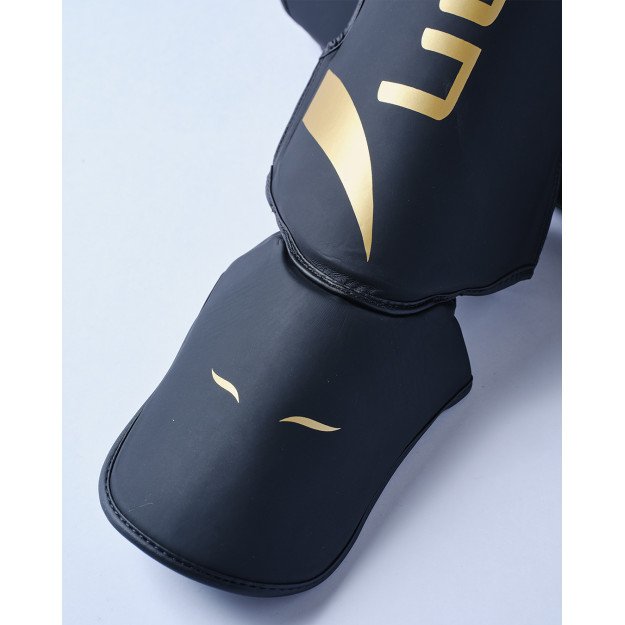 Protège Tibia et Pied Elion Extravagant Noir/Or