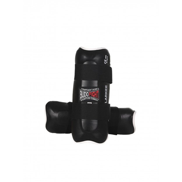 Protege-tibia rigide