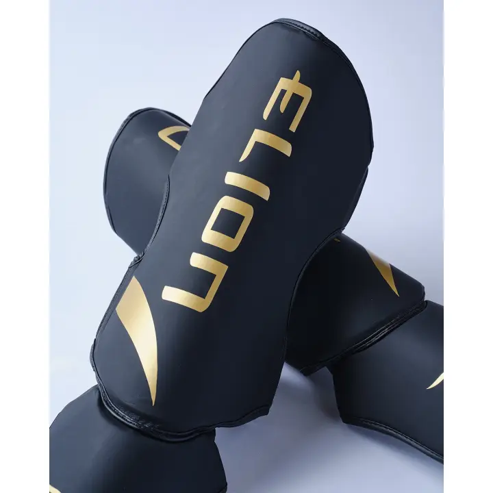 Protège-tibias et pieds Elion Extravagant Noir/Or