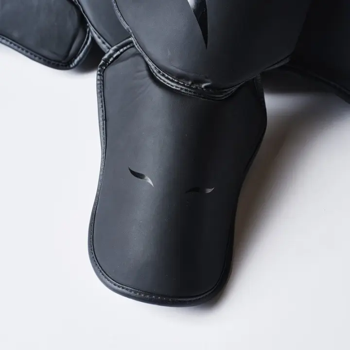 Protège-tibias et pieds Elion Extravagant Noir